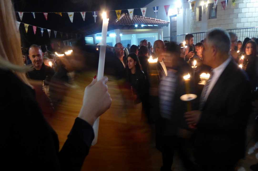 Easter procession with candles lit from the Holy Fire